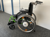 Rollstuhl mit Antriebshilfe E-Fix